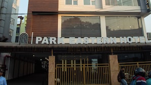 A multi-story building with a sign reading "Park Eastern Hotel". - PARK EASTERN HOTEL (Kolkata)