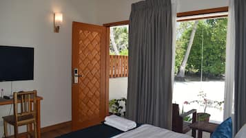 Deluxe Double Room, Non Smoking, Garden View | In-room safe, laptop workspace, iron/ironing board, free WiFi