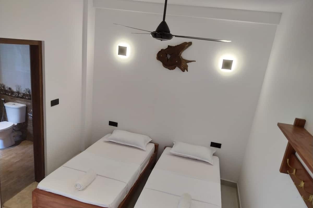 Double or Twin Room, 2 Twin Beds, Patio, Garden View | Blackout drapes, soundproofing, iron/ironing board, free WiFi