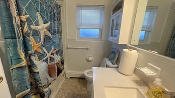 Hair dryer, bidet, towels, soap