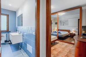 2 bedrooms, in-room safe, iron/ironing board, travel cot