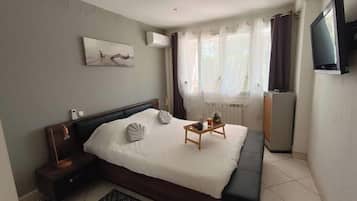1 Schlafzimmer, BĂŒgeleisen/BĂŒgelbrett, Reisekinderbett, BettwĂ€sche