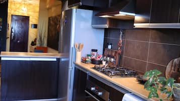 Deluxe Apartment, Garden View | 1 bedroom, desk, laptop workspace, blackout drapes