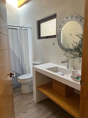Hair dryer, towels, soap, toilet paper