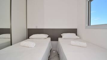 2 quartos, acesso à internet, roupa de cama