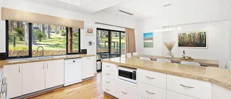 Coffee/tea maker, fridge, microwave, oven