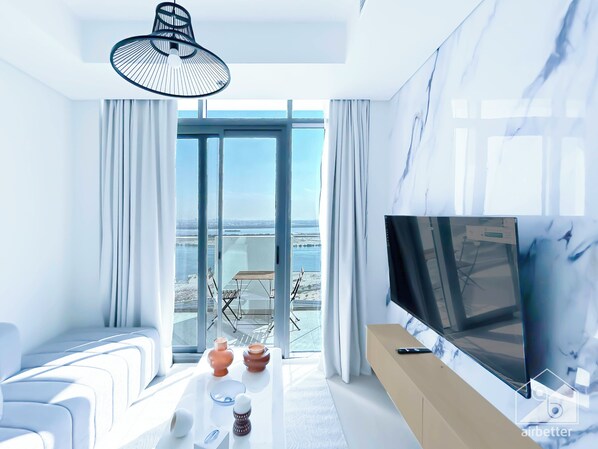 Living area - Luxury 1B with Balcony & partial Burj Khalifa view (Dubai)