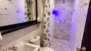 Hair dryer, towels, soap, shampoo