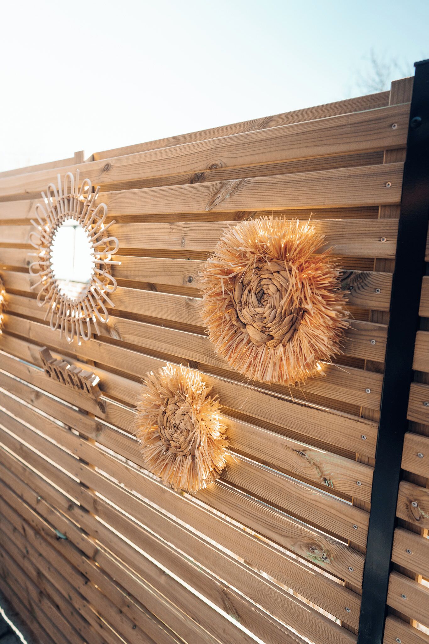 A wooden fence with decorative elements.