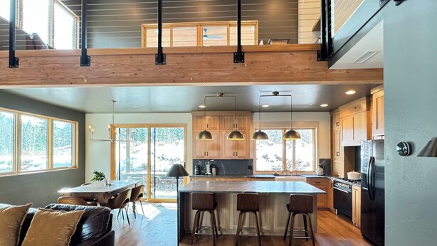 A spacious kitchen with a central island, wooden cabinets, and modern appliances. - Paradise at Purg that sleeps 16 across from resort (Durango)