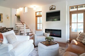 Smart TV, fireplace, books