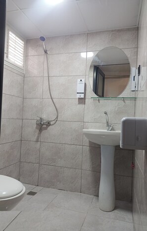 Shower, free toiletries, hair dryer, slippers