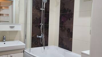 Hair dryer, towels, soap, shampoo