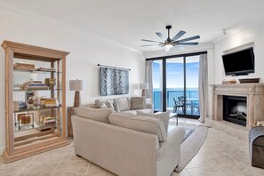 TV, fireplace, books