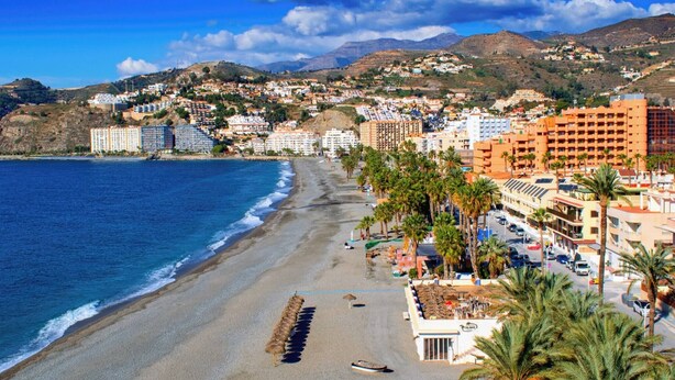 A coastal town with a beach, beachfront buildings, and palm trees. - Casita Mezcal, in City Center With Great Views (Almunecar)