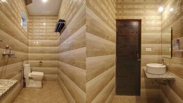 Shower, towels, soap, toilet paper