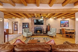 Smart TV, fireplace, books, music library