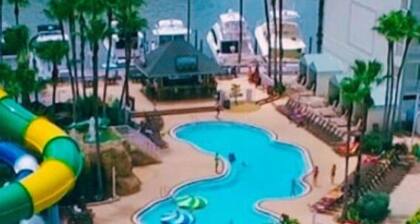 New! Waterfront Hot Tub, Heated Pool, King Beds, 4 Baths, Golf Cart, Privacy!