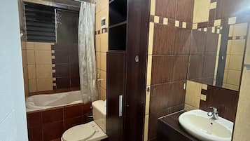 Shower, towels, soap, toilet paper