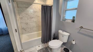 Hair dryer, towels, soap, toilet paper
