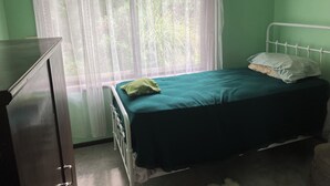A room with a bed, a dresser, and a window with sheer curtains. - One or Two rooms in house in O'Connor close to Civic, Dickson and Belconnen! (O'Connor)
