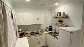 Microwave, stovetop, coffee/tea maker, electric kettle