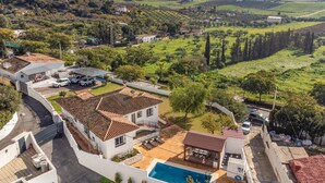 A residential property with a swimming pool, a covered patio, and a view of the surrounding countryside. - 3 bedroom stunning home in Coin (Coin)