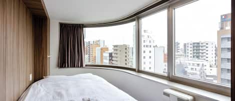 Basic Double Room, City View (Shared bathroom only) | Free WiFi, bed sheets
