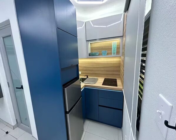 Fridge, microwave, coffee/tea maker, toaster