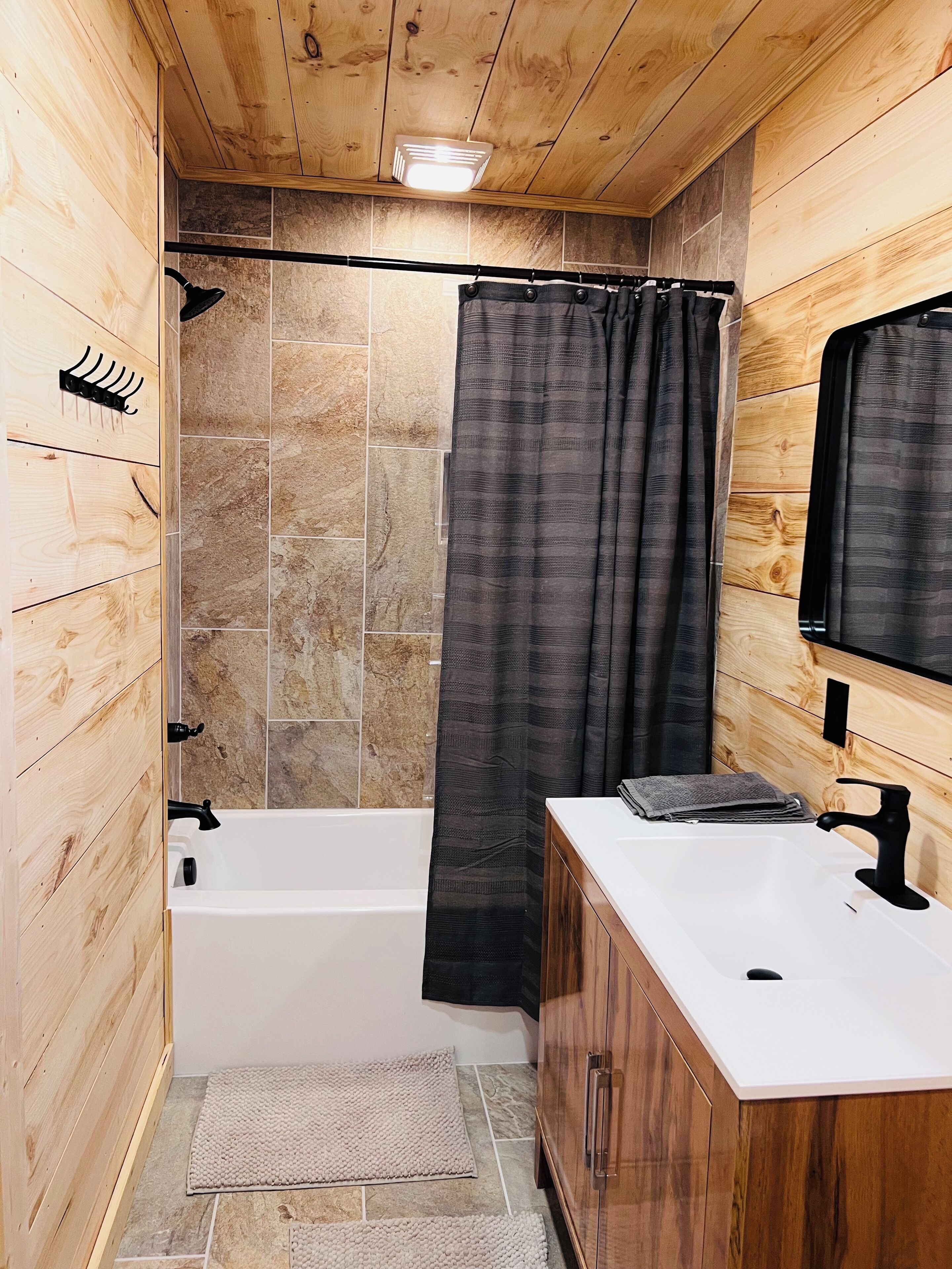 Shower, towels, soap, toilet paper