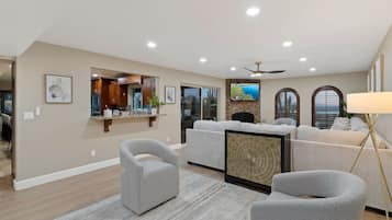 TV connectée, cheminée, livres, imprimantes