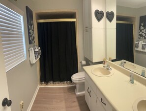 Shower, towels, toilet paper