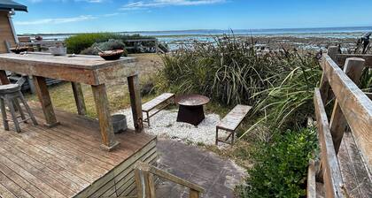 3 bedroom house with the beach literally at your front door.