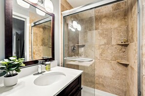 Hair dryer, towels, soap, toilet paper