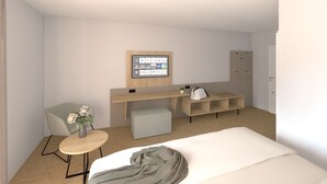 Een moderne hotelkamer met een bed, een bureau, een stoel, een bijzettafeltje met bloemen en een aan de muur bevestigde televisie.