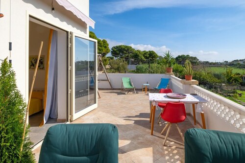 VillaSalentu.it, Lu Sule with a huge terrace overlooking the sea, sky, land.