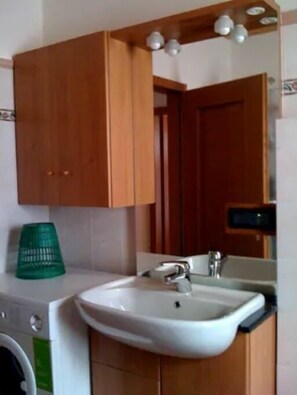 Hair dryer, soap, toilet paper