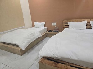 1 bedroom, premium bedding, memory-foam beds, blackout curtains
