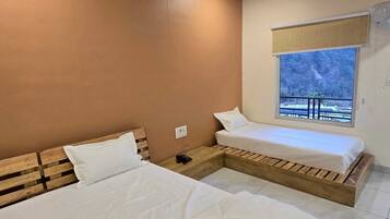 1 bedroom, premium bedding, memory-foam beds, blackout curtains