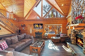 TV, fireplace - Lazy Bear Manor By Destination Big Bear: Game Room! Hot Tub! Pet Friendly! Views of Bakers Pond! Close to Hiking Trails! (Big Bear City)