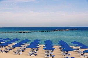 Private beach, sun loungers, beach umbrellas, beach towels