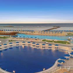 15 outdoor pools, pool umbrellas, pool loungers