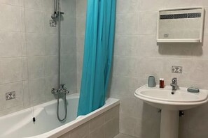 Hair dryer, bidet, towels, soap