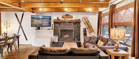 Smart TV, fireplace, foosball, books