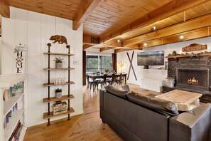 Smart TV, fireplace, table football, books