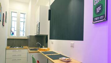 Mini-fridge, microwave, oven, stovetop