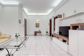 Apartment, 2 Bedrooms, Kitchen, City View | Living area | 40-inch flat-screen TV with cable channels - Cozy 2-Bedroom Flat with Balcony (Rome)