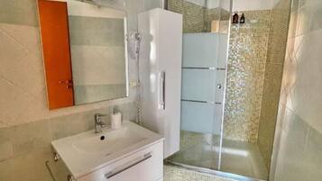 Hair dryer, towels, soap, toilet paper