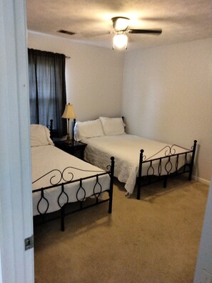 4 bedrooms, desk, iron/ironing board, travel cot