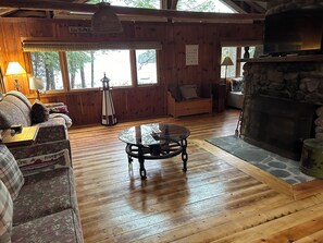 Smart TV, fireplace, books - Welcoming 4-bedroom lake front cabin in charming Otis on Beech Hill Pond. (Otis)